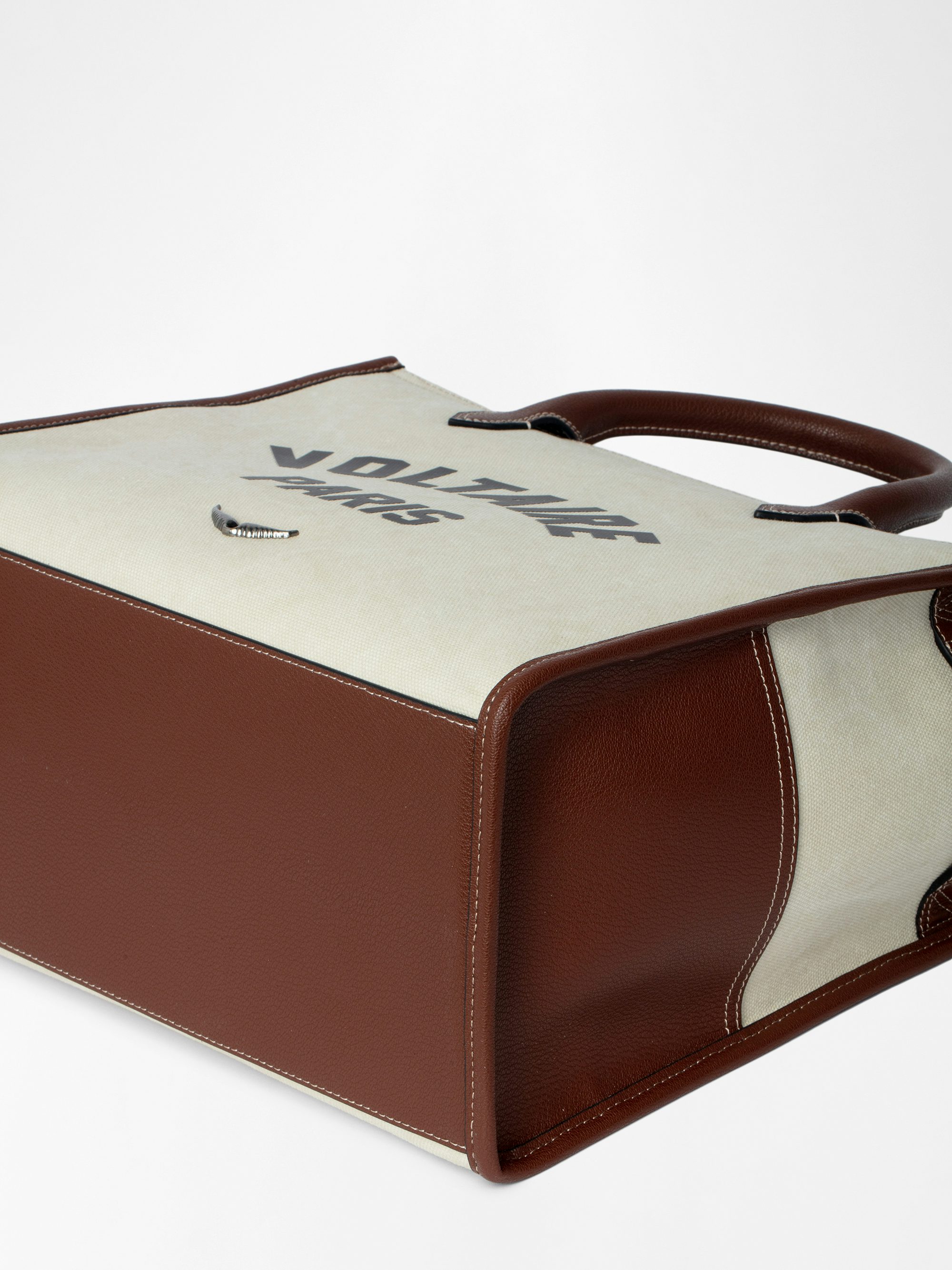 Angel Tote - Canvas and grained leather tote bag with double handles, shoulder strap and wing signature.